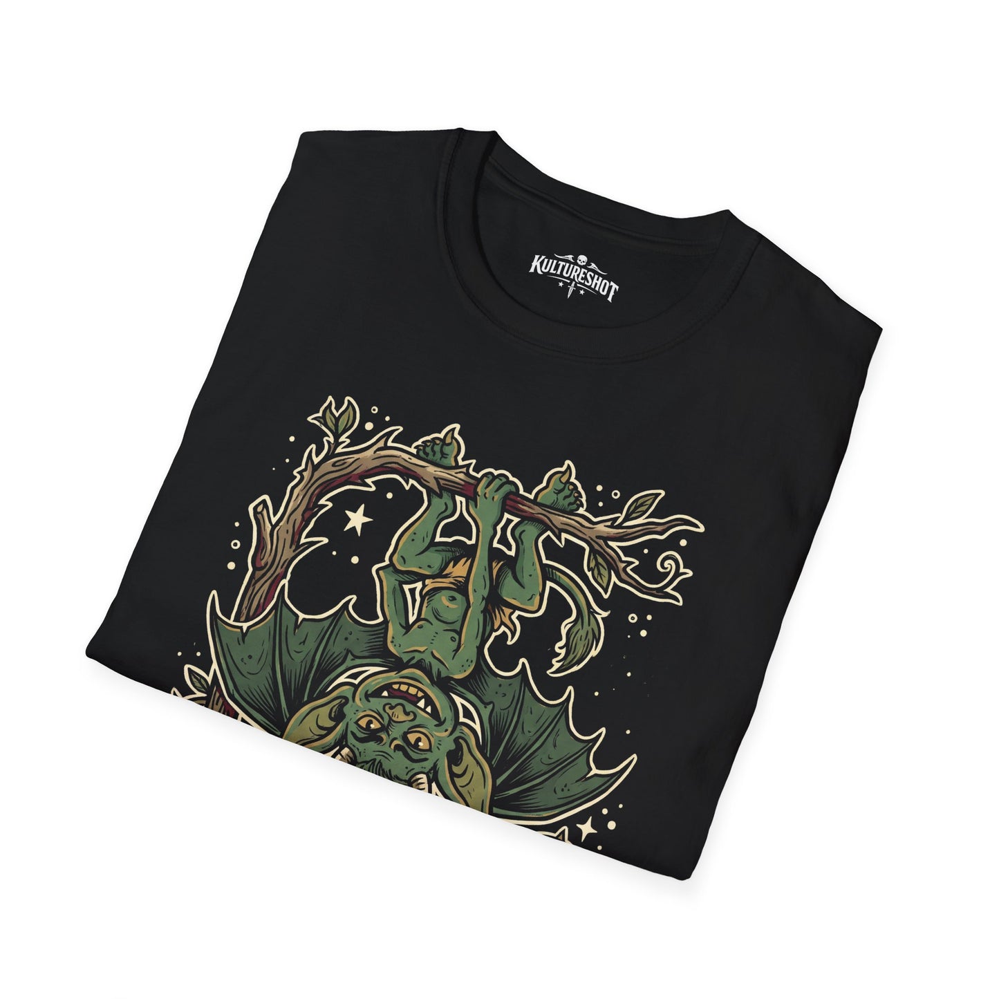 Folded black t-shirt with graphic design on a white background