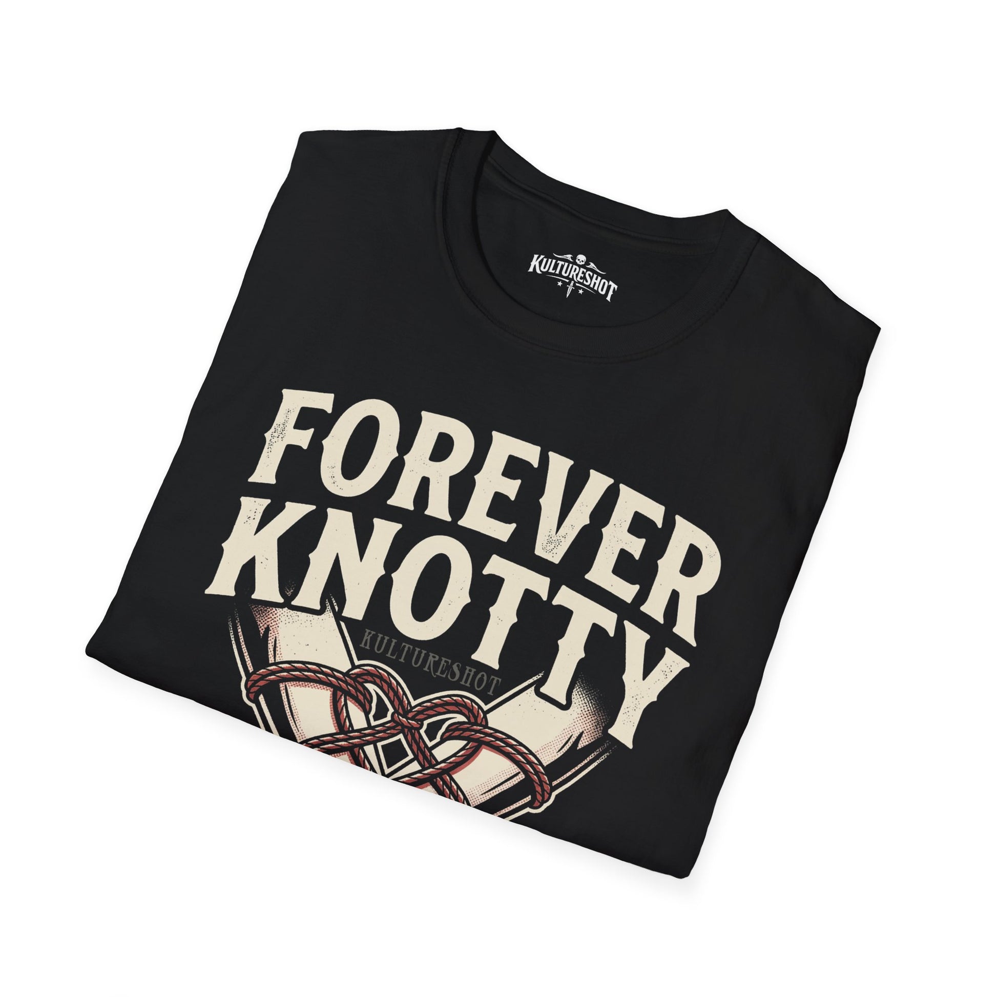 Folded black t-shirt with white text on a white background