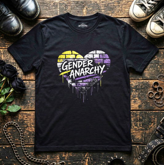 Black t-shirt with 'Gender Anarchy' design on a wooden surface with shoes and chains.