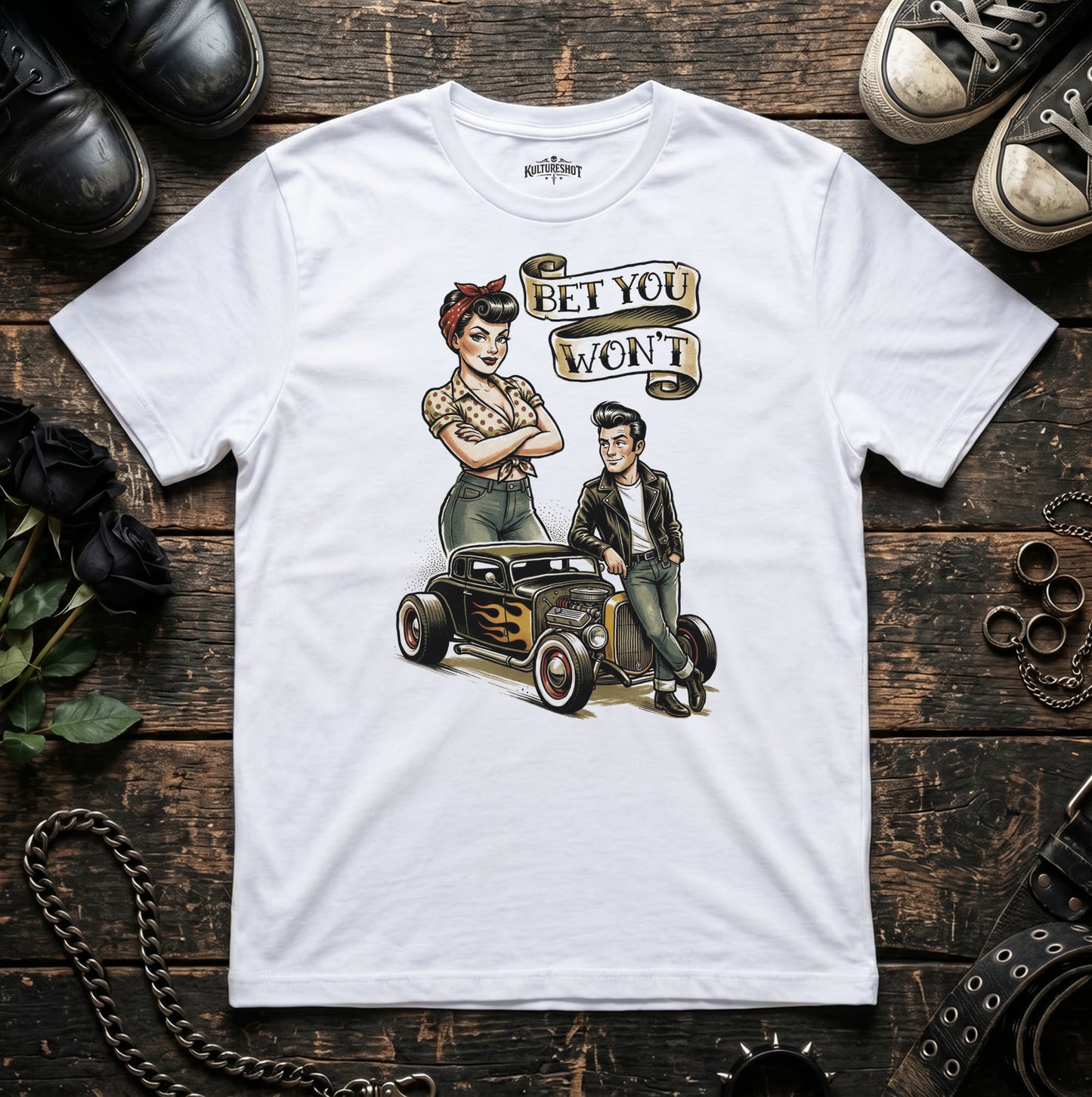 White t-shirt with a graphic design of a couple and a car on a wooden surface