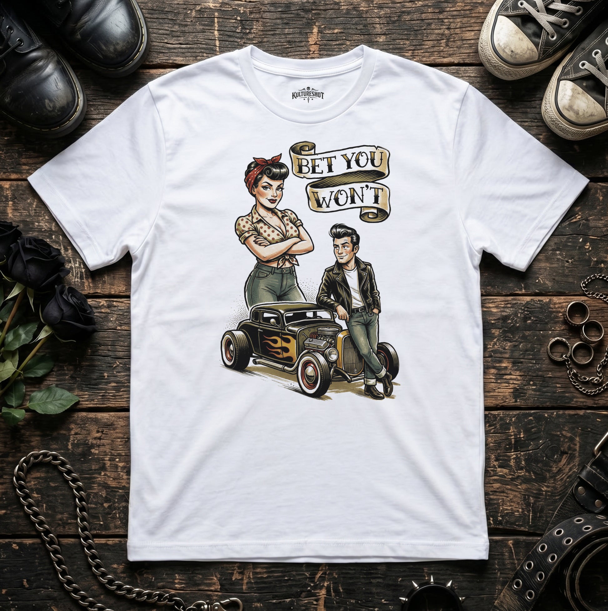 White t-shirt with a graphic design of a couple and a car on a wooden surface