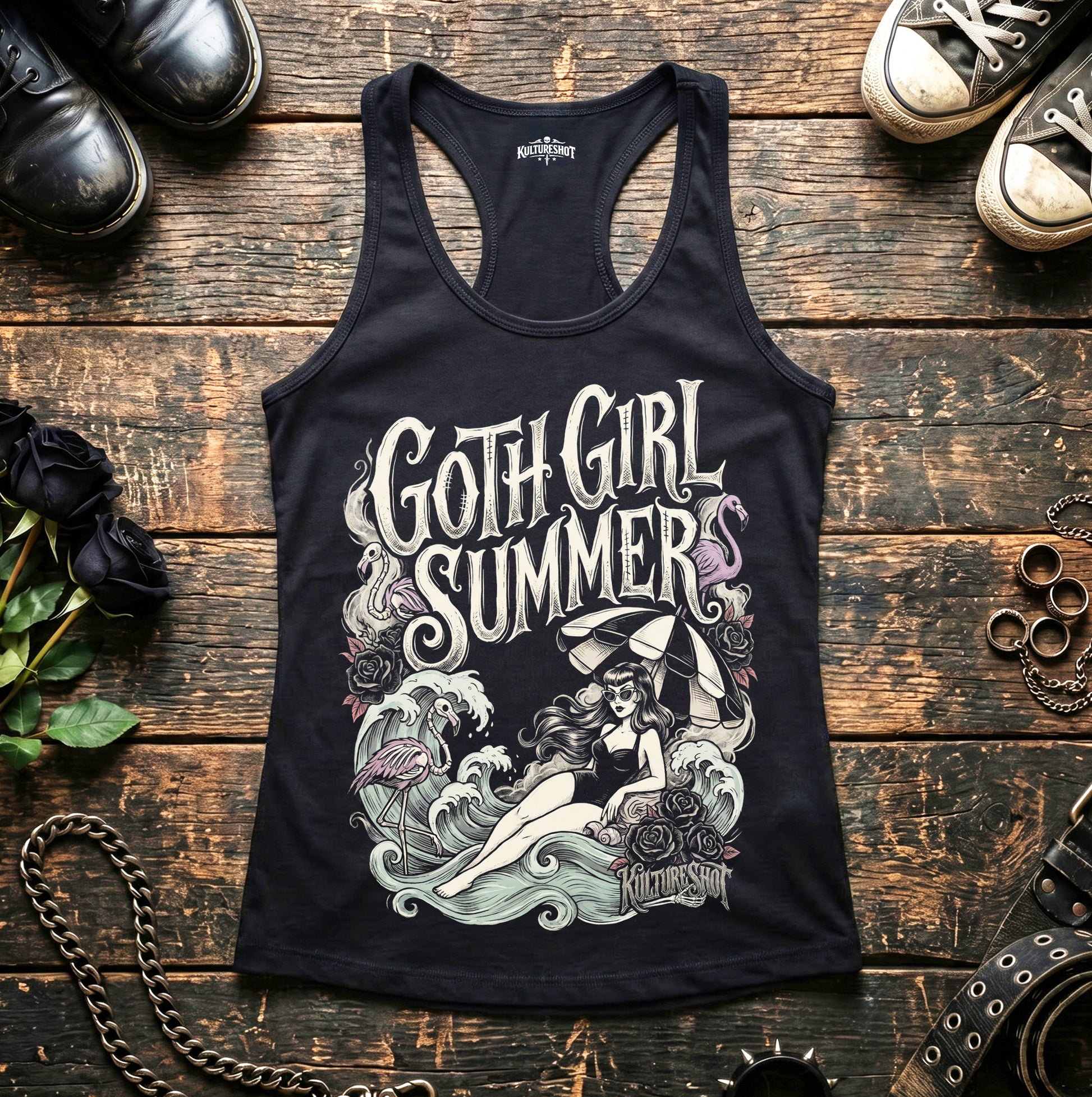 Black tank top with 'Goth Girl Summers' design on a wooden surface with shoes and roses.
