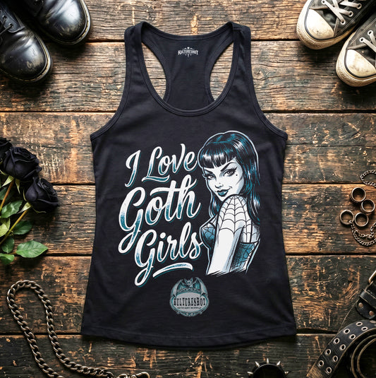 Black tank top with 'I Love Goth Girls' graphic on a wooden surface with shoes and accessories.